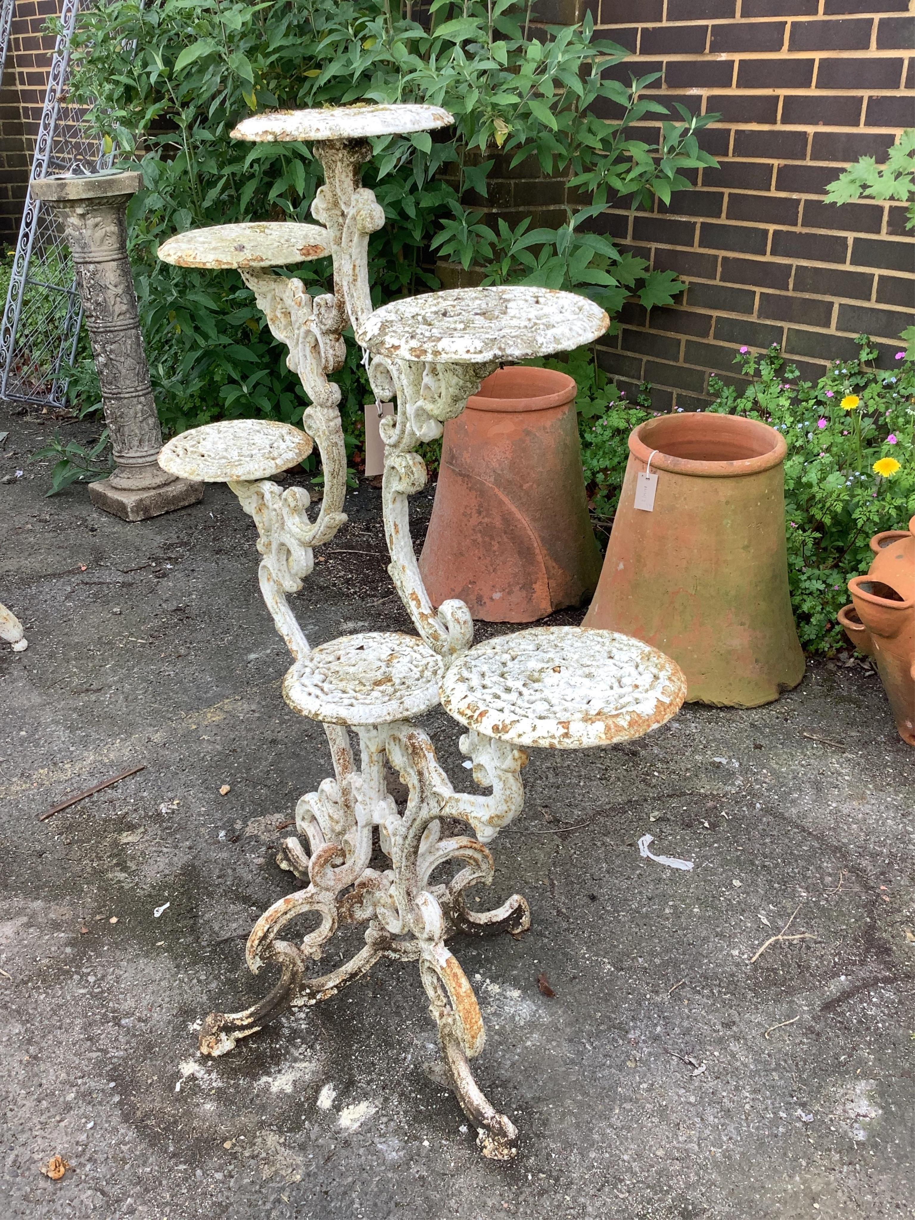 A Victorian style cast iron pot stand, height 101cm